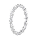 Top-down view of a D-color VVS1 alternating marquise and round stone full eternity wedding band in white gold.