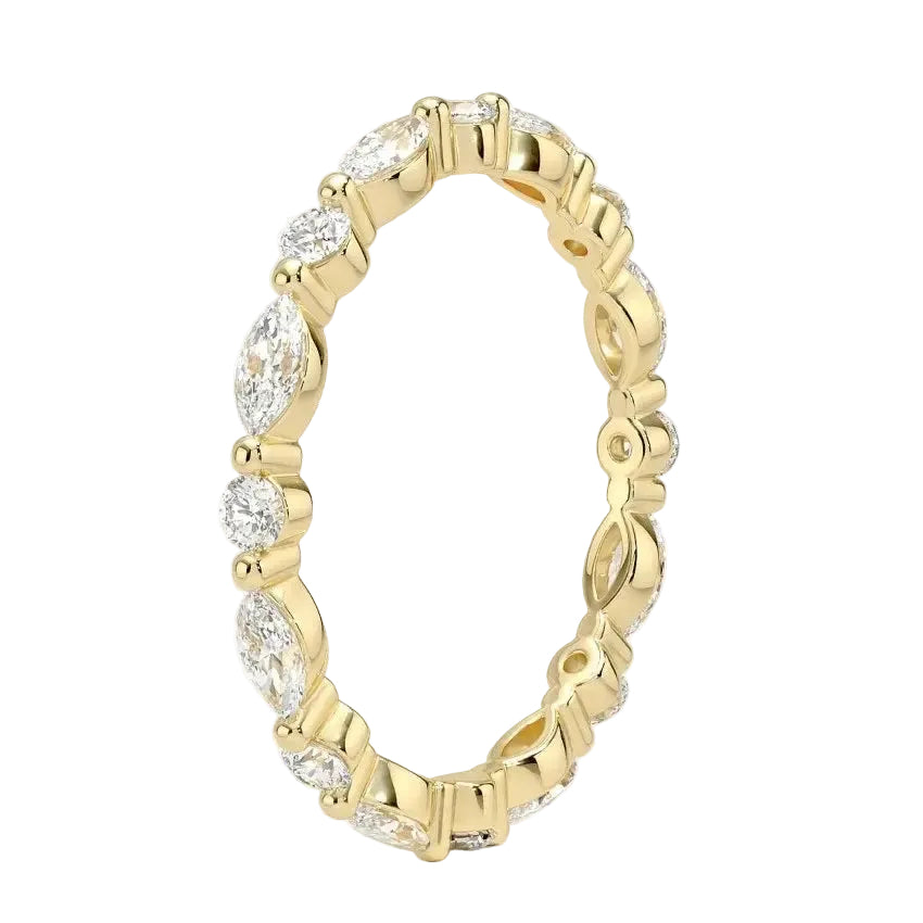 Top-down view of a D-color VVS1 alternating marquise and round stone full eternity wedding band in yellow gold.