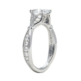 Close-up of the tapered pavé band and six-prong marquise mount