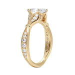 Close-up of the tapered pavé band and six-prong marquise mount
