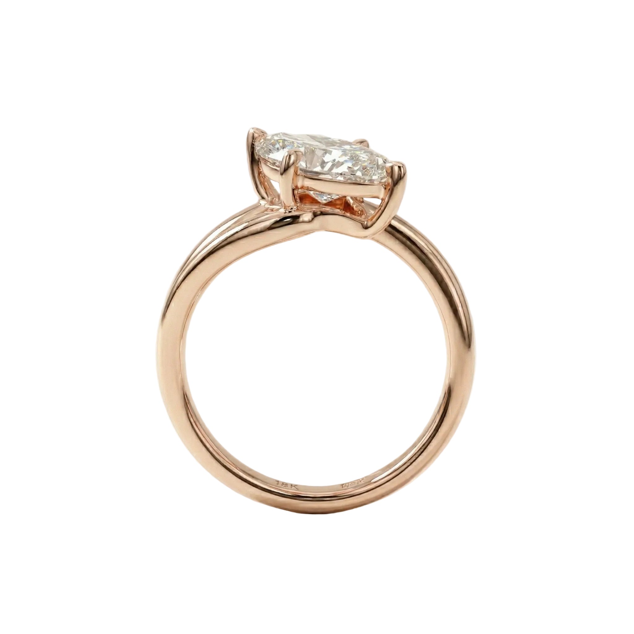 Top-down view of a D-color VVS1 marquise brilliant moissanite in a yellow gold solitaire setting.