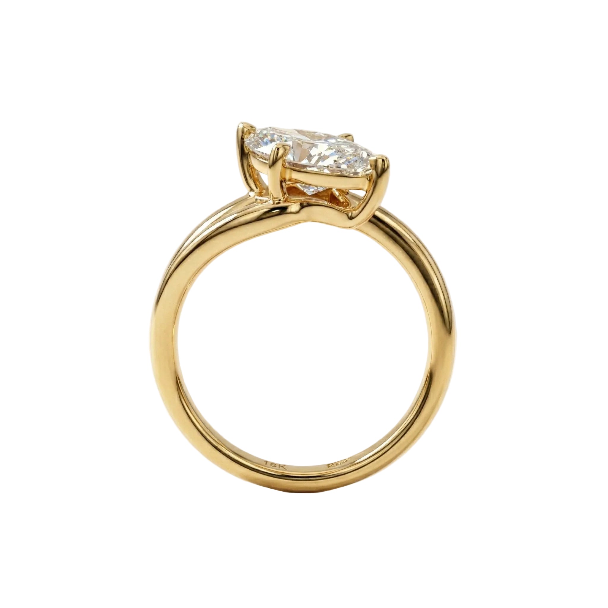 Top-down view of a D-color VVS1 marquise brilliant moissanite in a yellow gold solitaire setting.