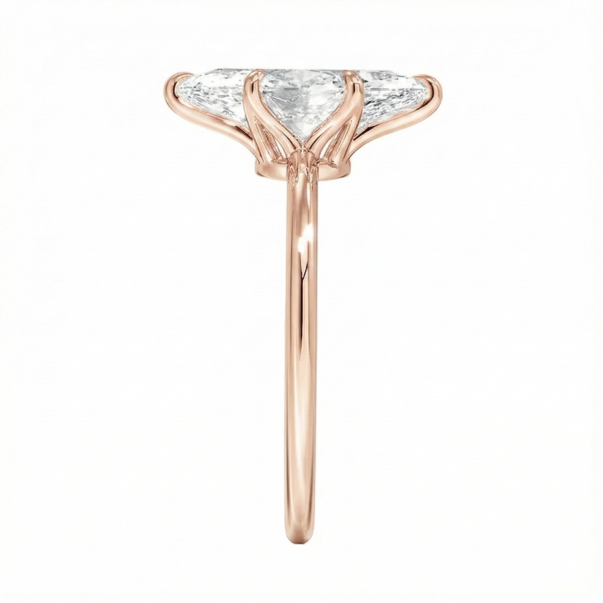 Symmetrical top-down view of a marquise moissanite solitaire in a polished rose gold setting.