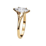 Symmetrical top-down view of a marquise moissanite solitaire in a polished yellow gold setting.