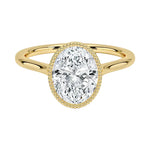 Oval shape Moissanite lab grown diamond engagement ring round shank with a bezel setting, on a gold band, against a white background.Moissanite engagement ring cape town south africa grand diamonds ralph jacobs jeulia 