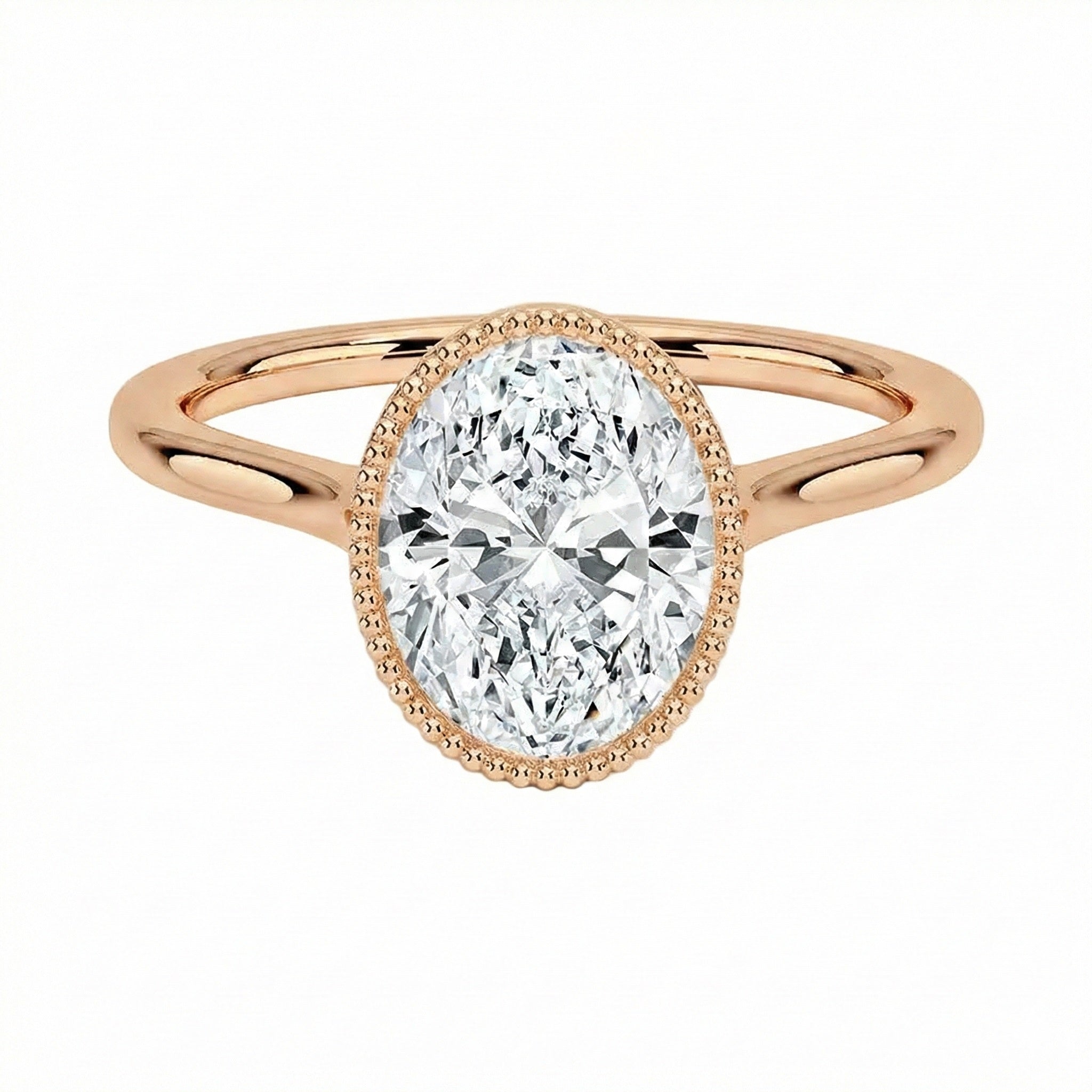 Rose gold ring with a pear-shaped diamond on a white background