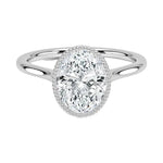 Oval shape Moissanite lab grown diamond engagement ring round shank with a bezel setting, on a gold band, against a white background.Moissanite engagement ring cape town south africa grand diamonds ralph jacobs jeulia 