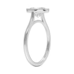 Oval shape Moissanite lab grown diamond engagement ring round shank with a bezel setting, on a gold band, against a white background.Moissanite engagement ring cape town south africa grand diamonds ralph jacobs jeulia 