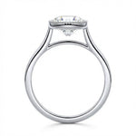 Milgrain detail on gold bezel setting round brilliant stone VVS clarity close up