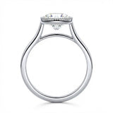 Milgrain detail on gold bezel setting round brilliant stone VVS clarity close up