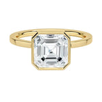The Modern Asscher cut moissanite ring with a smooth yellow gold bezel ApolloGem
