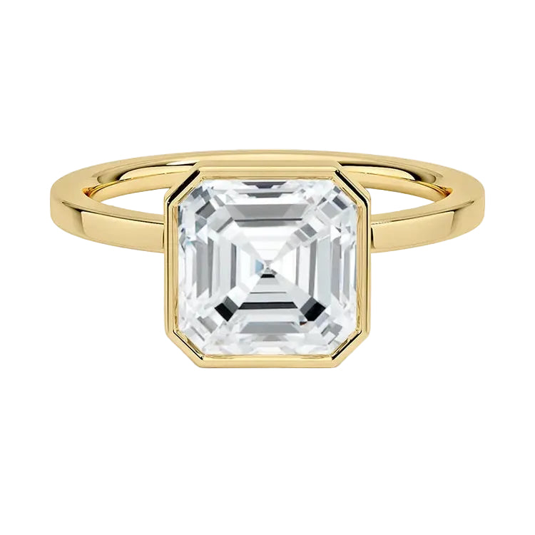 Asscher-cut Moissanite engagement ring with a bezel setting, displayed on a gold band, against a white background.Moissanite engagement ring cape town south africa grand diamonds ralph jacobs jeulia 