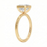 Top-down view of a D-color VVS1 Asscher stone in a polished yellow gold bezel