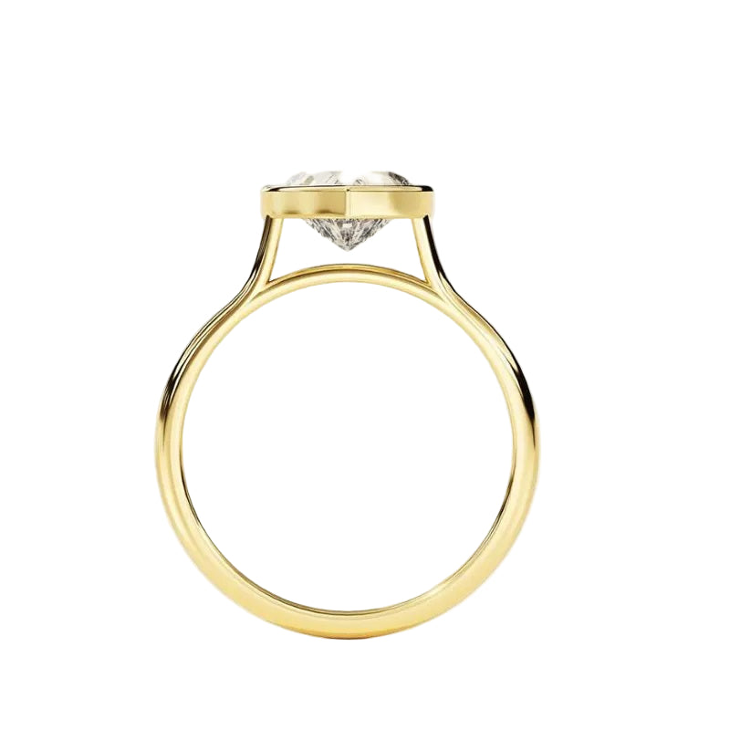  Heart shape Moissanite lab grown diamond engagement ring round shank with a bezel setting, on a gold band, against a white background.Moissanite engagement ring cape town south africa grand diamonds ralph jacobs jeulia "