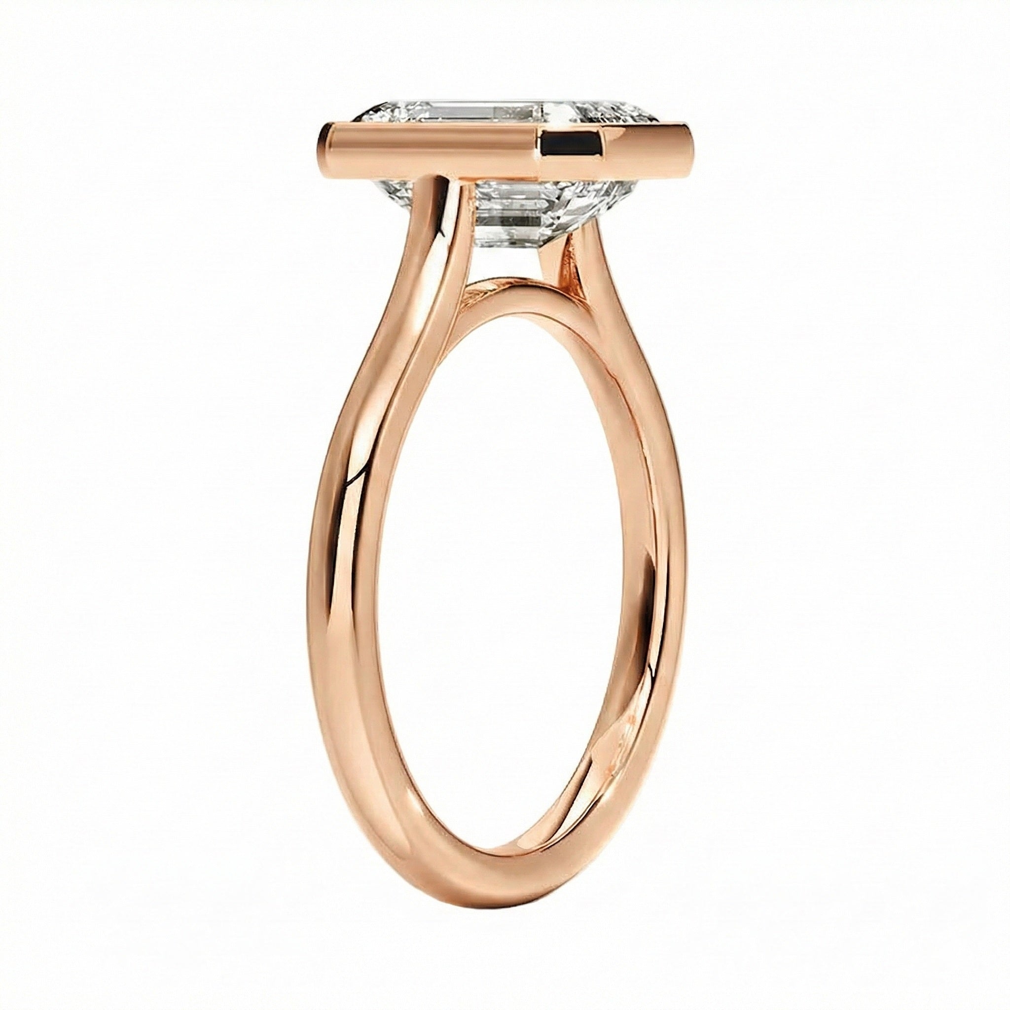 Top-down view of a D-color VVS1 princess stone in a polished rose gold bezel setting.