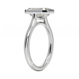 Top-down view of a D-color VVS1 princess stone in a polished white gold bezel setting.