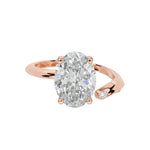 Luxury oval cut moissanite engagement ring with a modern bypass asymmetrical band in rose gold ApolloGem South Africa.