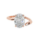 Luxury oval cut moissanite engagement ring with a modern bypass asymmetrical band in rose gold ApolloGem South Africa.