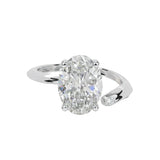 Luxury oval cut moissanite engagement ring with a modern bypass asymmetrical band in white gold ApolloGem South Africa.
