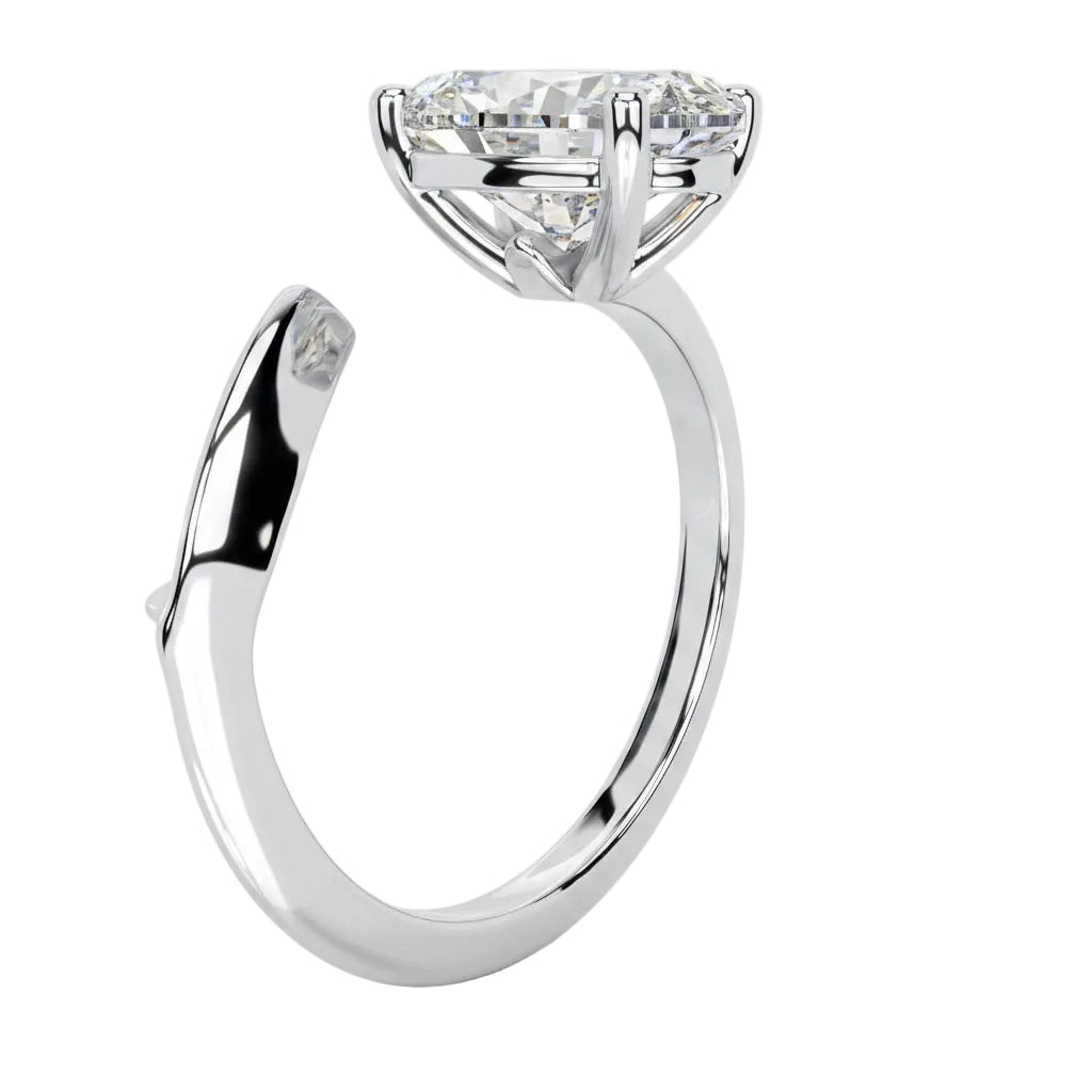 Four-prong oval solitaire with a unique contemporary shank design and high-quality GRI certified stones.
