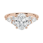 Luxury oval cut moissanite engagement ring in rose gold featuring an organic cluster of round and marquise side stones ApolloGem South Africa.