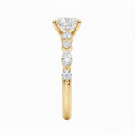 Detailed side view of an oval moissanite ring showing the unique bead-and-tube floating settings and GRI certified quality.