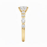 Detailed side view of an oval moissanite ring showing the unique bead-and-tube floating settings and GRI certified quality.