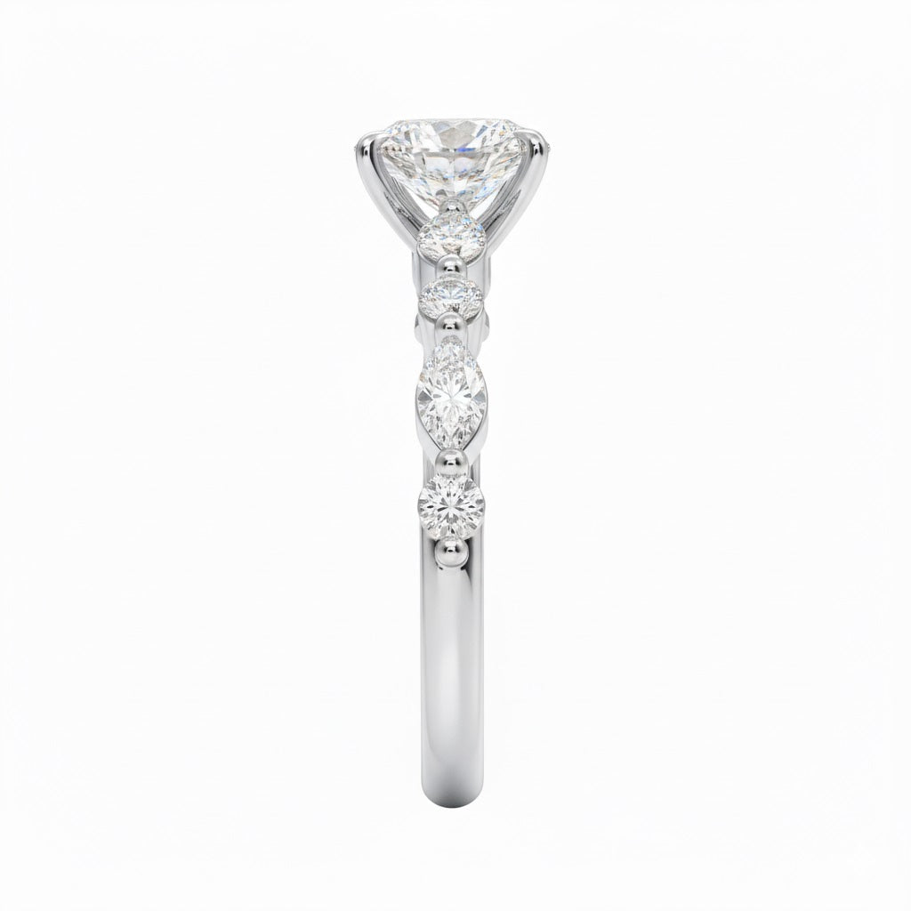 Oval cut Moissanite lab grown diamond engagement ring with tube set small round moissanites on the shank, on a gold band, against a white background.Moissanite engagement ring cape town south africa grand diamonds ralph jacobs jeulia 