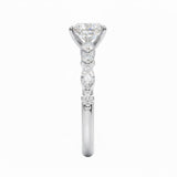 Oval cut Moissanite lab grown diamond engagement ring with tube set small round moissanites on the shank, on a gold band, against a white background.Moissanite engagement ring cape town south africa grand diamonds ralph jacobs jeulia 