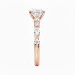 Oval cut Moissanite lab grown diamond engagement ring with tube set small round moissanites on the shank, on a gold band, against a white background.Moissanite engagement ring cape town south africa grand diamonds ralph jacobs jeulia 