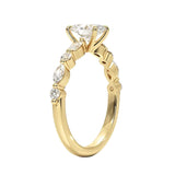 Oval cut Moissanite lab grown diamond engagement ring with tube set small round moissanites on the shank, on a gold band, against a white background.Moissanite engagement ring cape town south africa grand diamonds ralph jacobs jeulia 