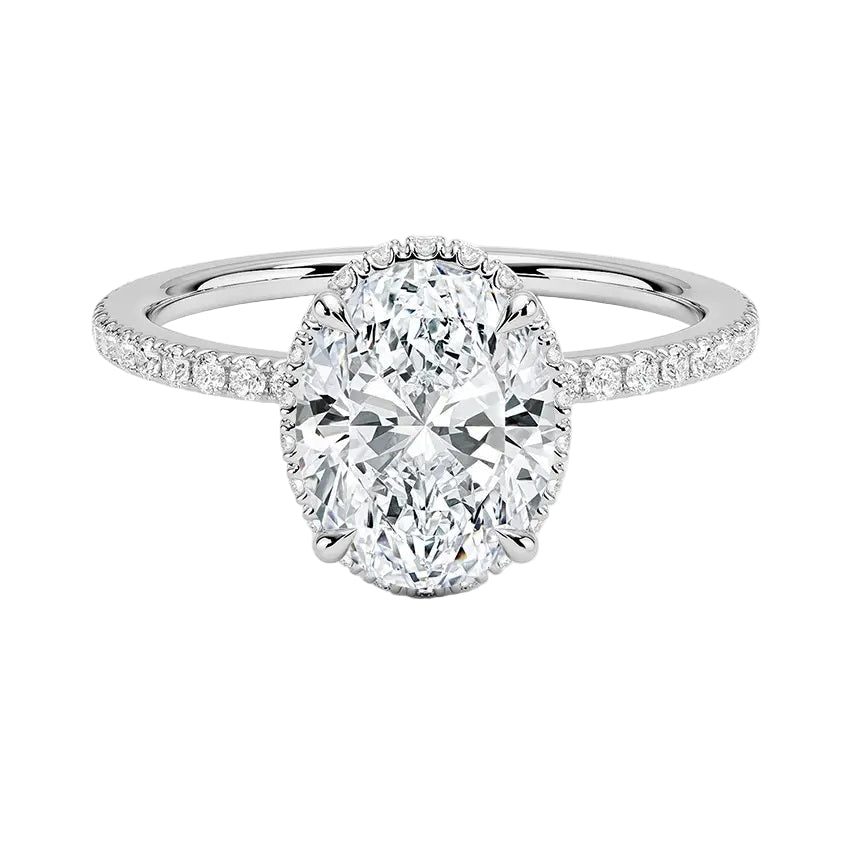 Luxury oval cut moissanite engagement ring in 9ct white gold with a double hidden halo and pavé band.