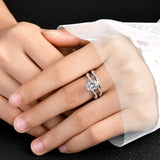 The Oval Duo Infinity set on a finger showing the flattering elongating effect and unified fire.