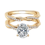 Close-up of a D-color VVS1 oval moissanite in a micro-pavé twisted bridal setting.