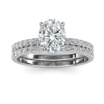 Side profile of the Oval Duo Infinity set showing the flush fit and pavé-set bands.