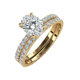 Oval brilliant cut moissanite bridal set with full eternity band in yellow gold ApolloGem.