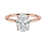 Oval-cut moissanite solitaire engagement ring with a timeless straight band, handcrafted by ApolloGem