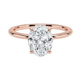 Oval-cut moissanite solitaire engagement ring with a timeless straight band, handcrafted by ApolloGem