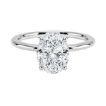 Oval-cut moissanite solitaire engagement ring with a timeless straight band, handcrafted by ApolloGem