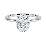 Oval-cut moissanite solitaire engagement ring with a timeless straight band, handcrafted by ApolloGem
