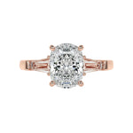 Oval cut moissanite engagement ring rose gold tapered baguette side stones