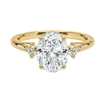 Luxury oval cut moissanite engagement ring in solid 18k yellow gold featuring a classic three-stone design with round brilliant accents ApolloGem South Africa
