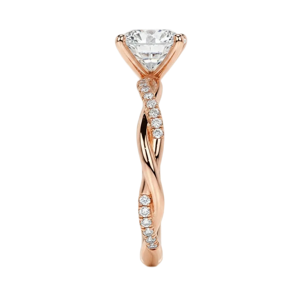 Close-up of a high-quality D-color VVS1 oval moissanite center stone on a shimmering pavé twisted shank.
