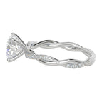 Silver ring with a diamond on a white background