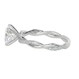 Silver ring with a diamond on a white background