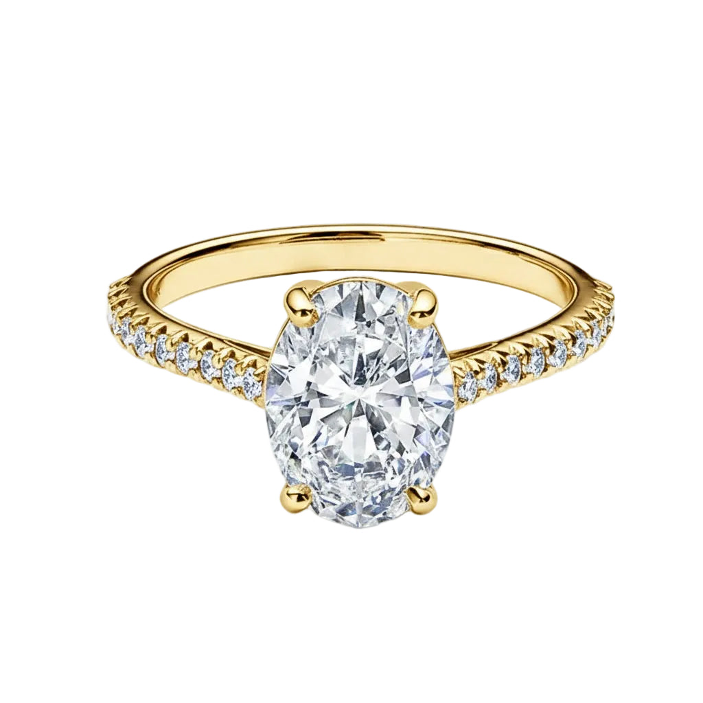 Sculpted four-claw oval solitaire style engagement ring with a pavé-set yellow gold band ApolloGem