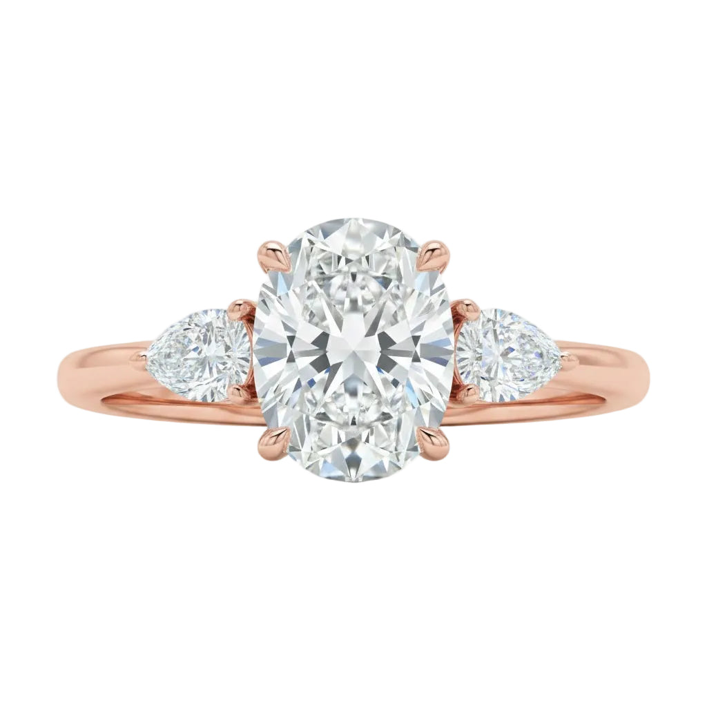 Detailed side view of an oval moissanite engagement ring showing the secure four-prong setting and teardrop pear-shaped side stones