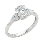 Close-up of a high-quality D-color VVS1 oval moissanite center stone with pear accents guaranteed by a GRI certificate.