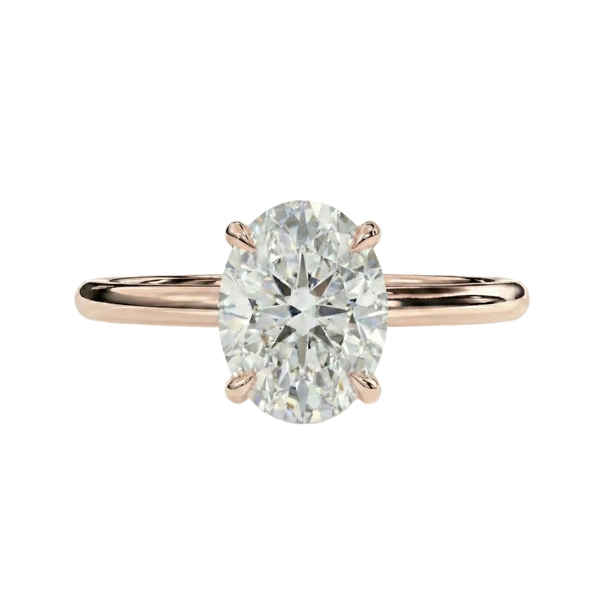 Rose gold ring with a large diamond on a white background