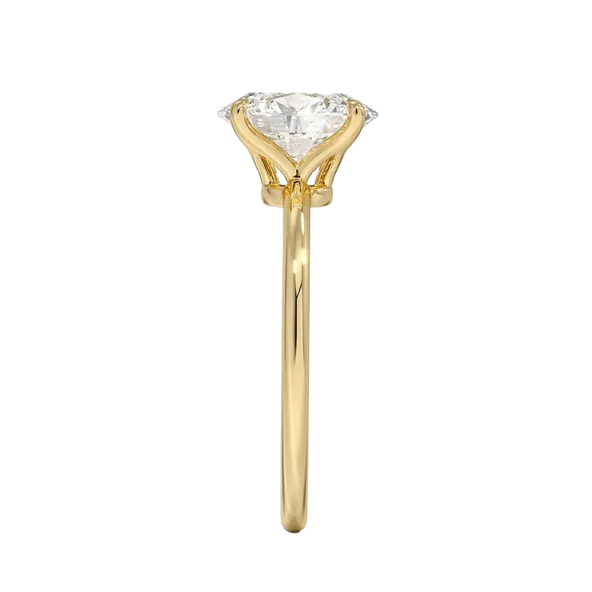 Symmetrical top-down view of an oval moissanite solitaire in a polished yellow gold setting.